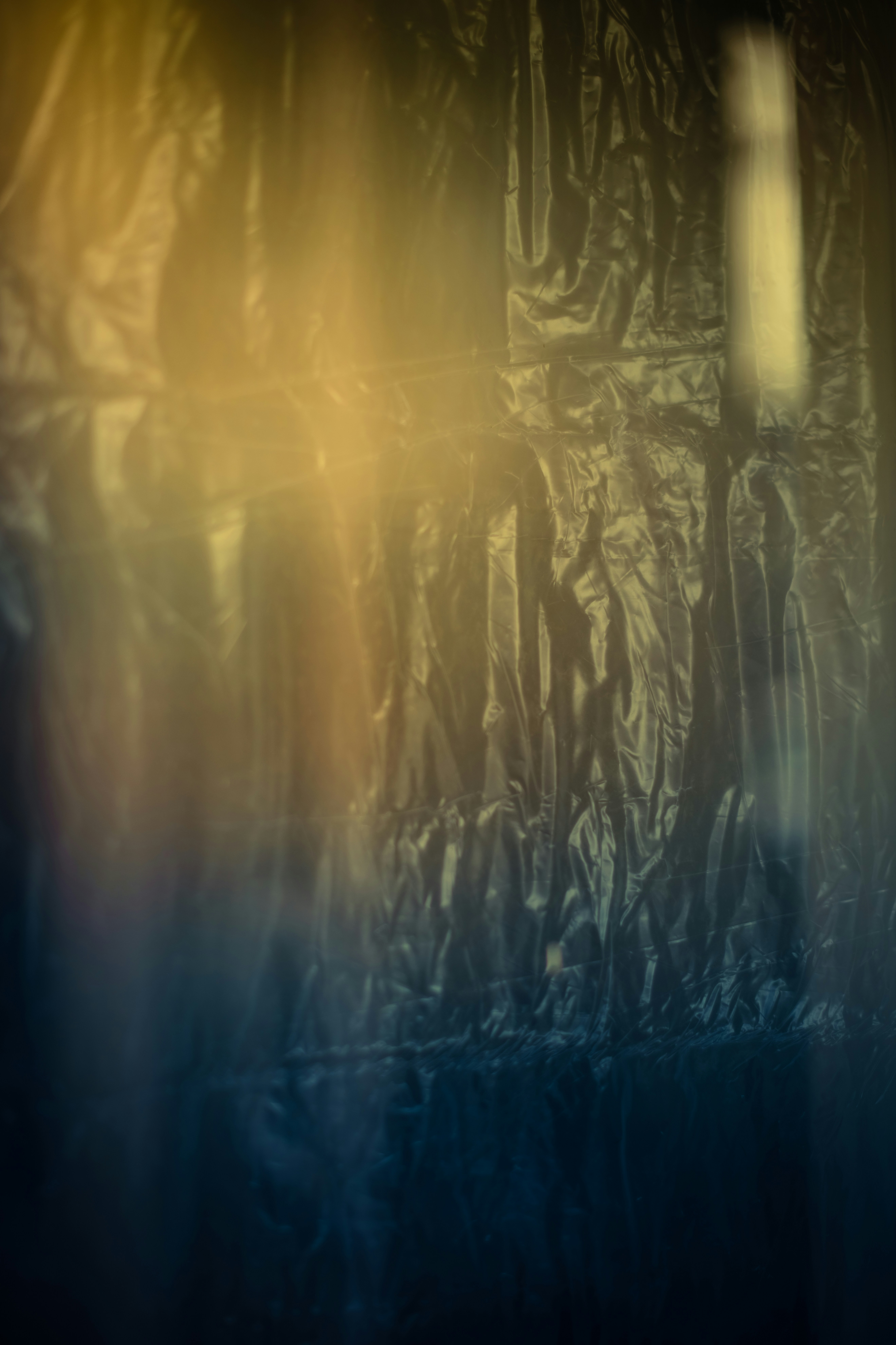 a blurry photo of a wall with a clock on it