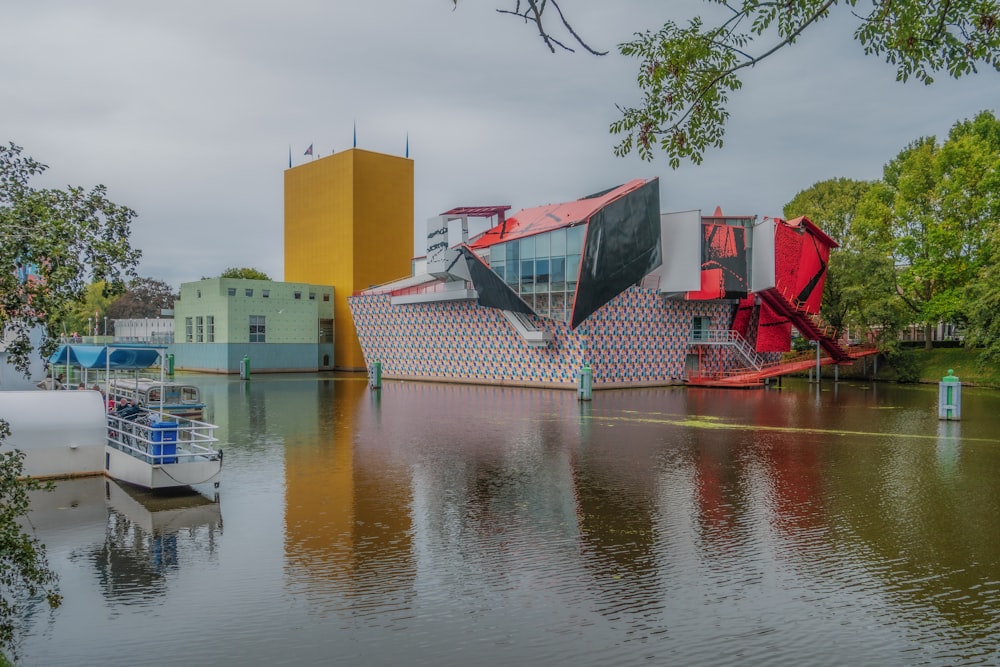 a body of water with a building in the background