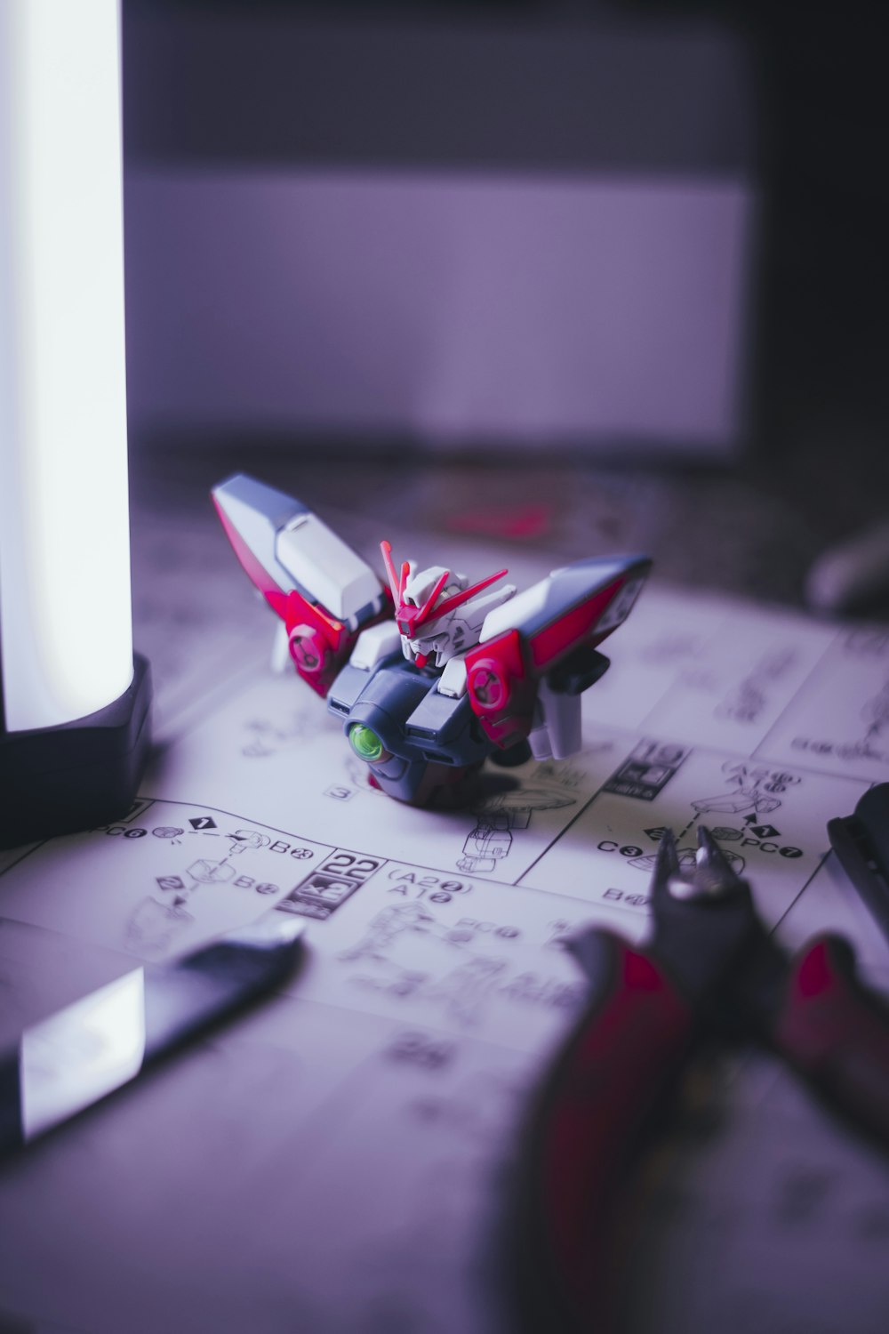 a close up of a toy airplane on a table