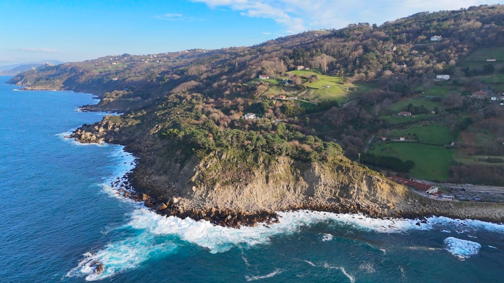 an aerial view of the ocean and coastline