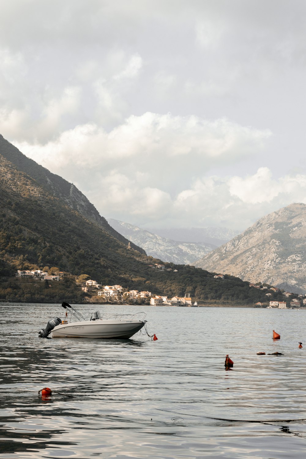 a boat floating on top of a large body of water