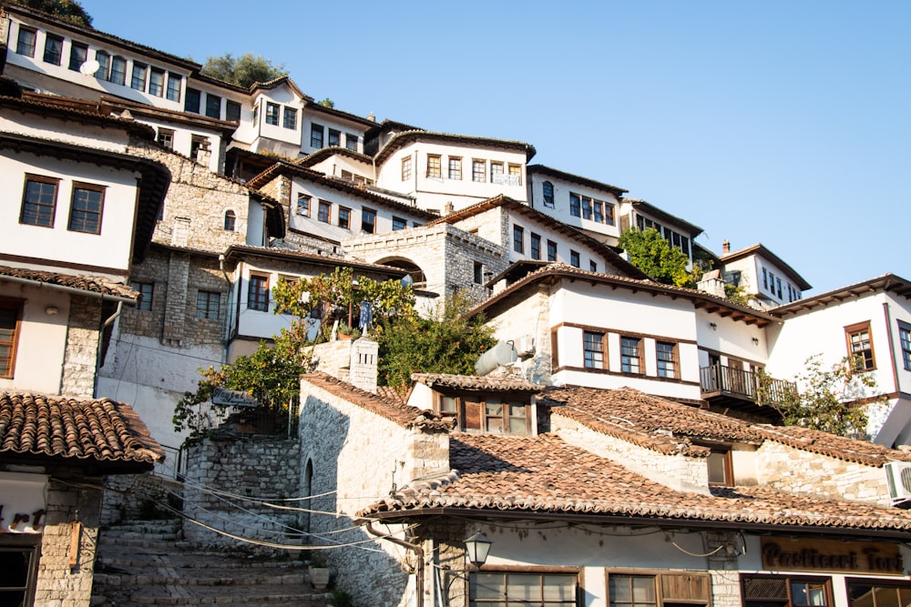 a bunch of houses that are on a hill