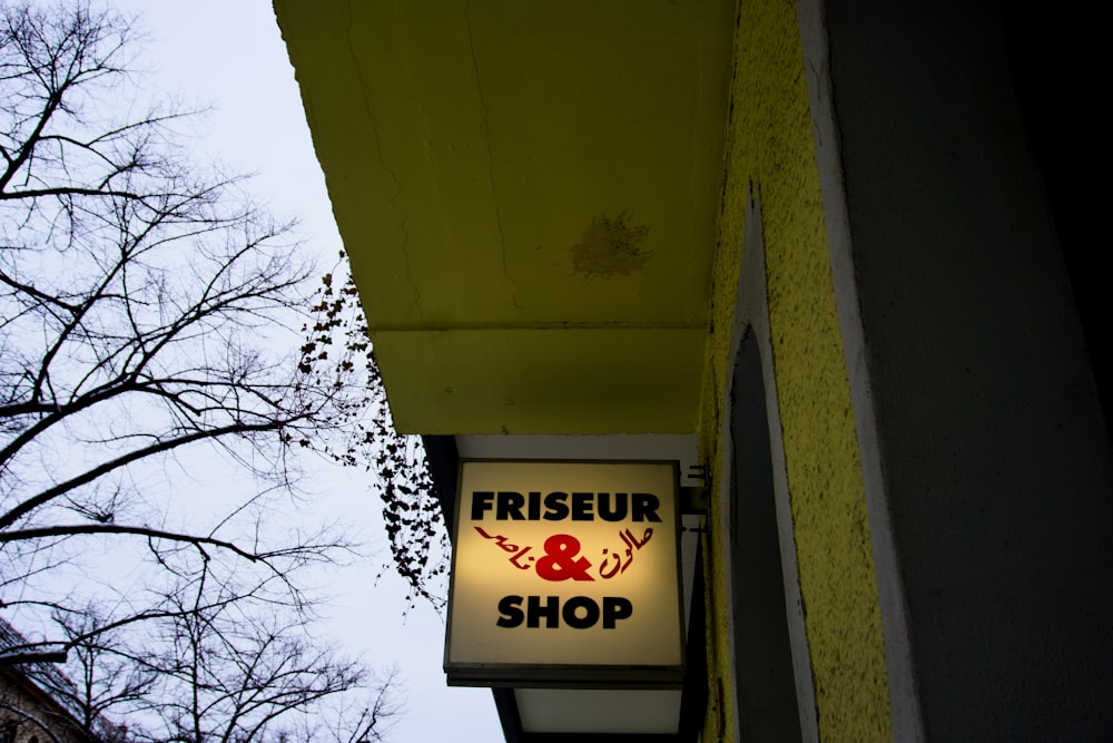 a neon sign on the side of a building