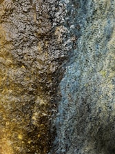 a close up of a wall with a brown and blue color scheme