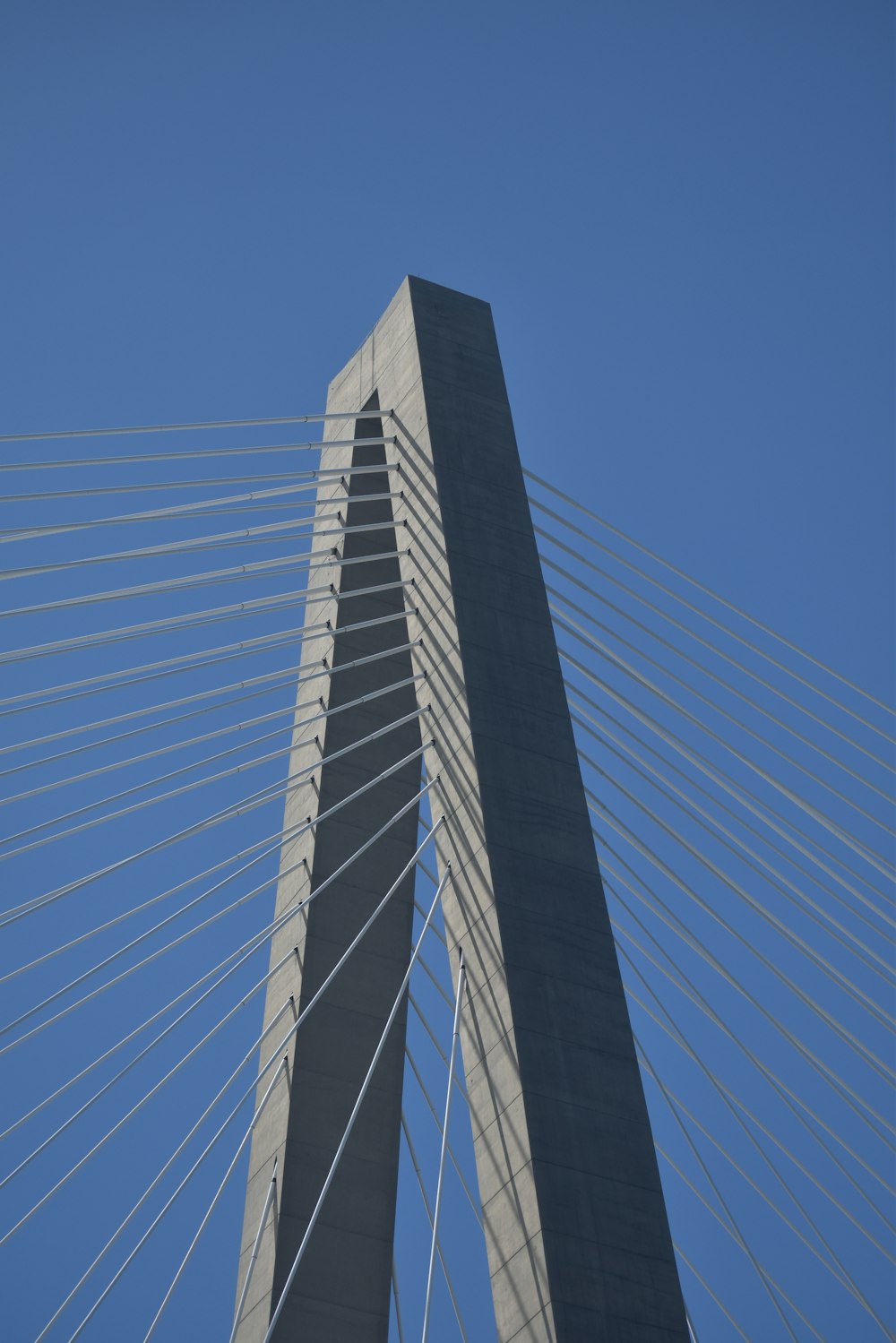 a very tall bridge with a very tall tower