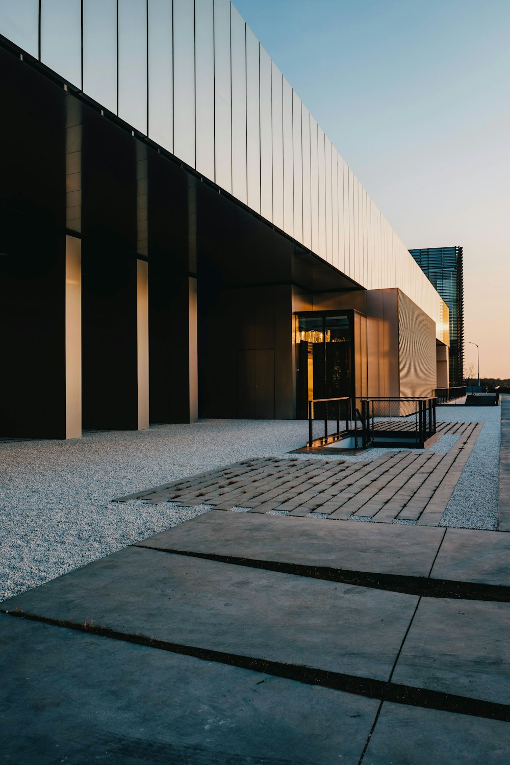 a building that has a bunch of benches in front of it