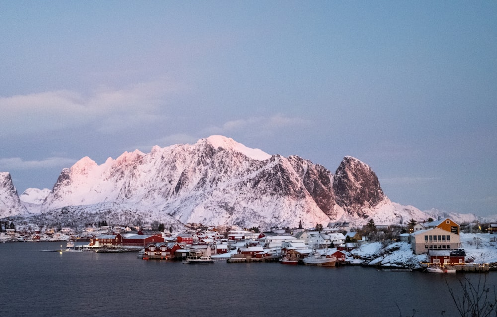 a snow covered mountain range in the distance