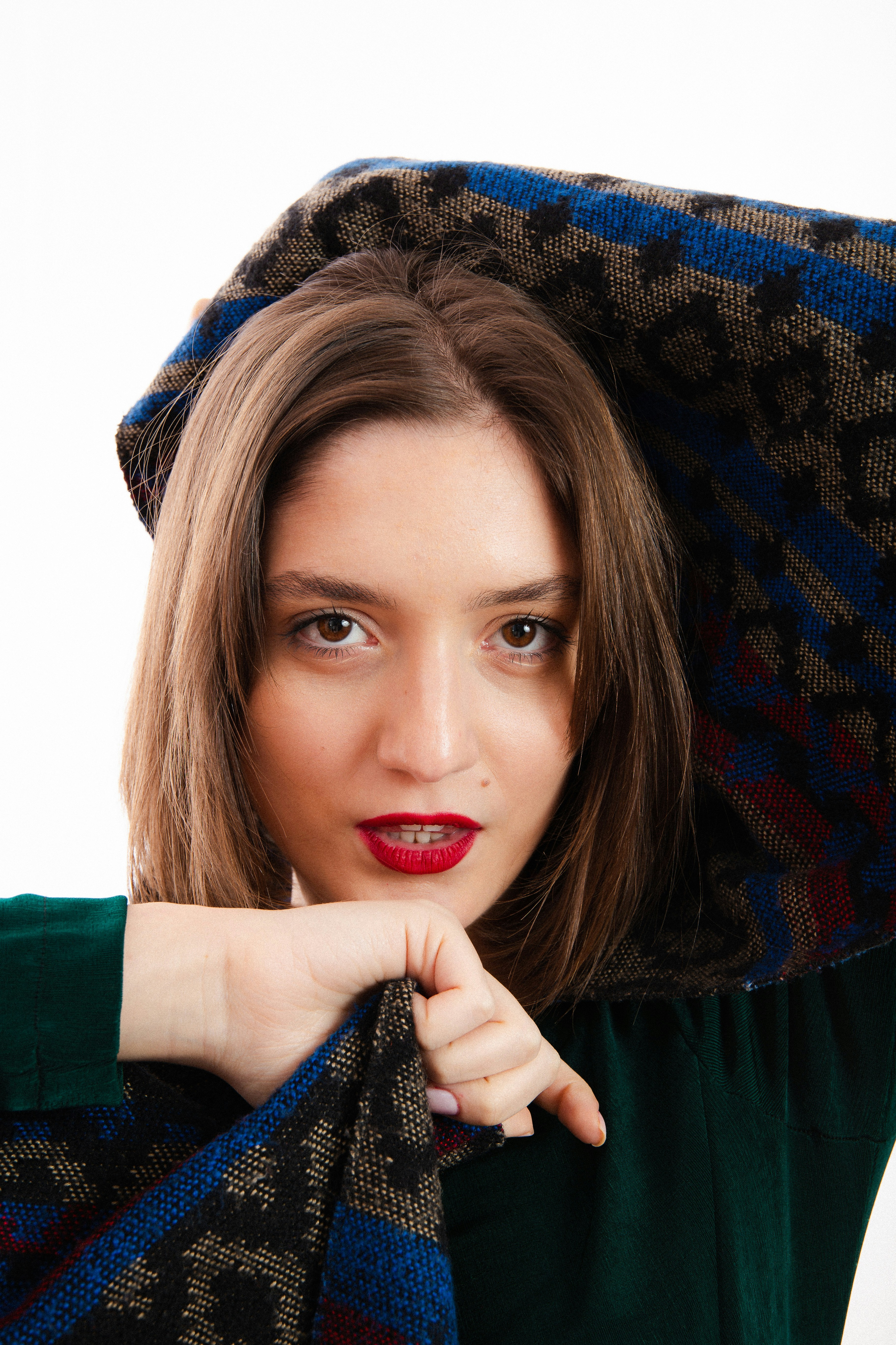 A woman with a scarf around her neck photo – Free Black Image on Unsplash