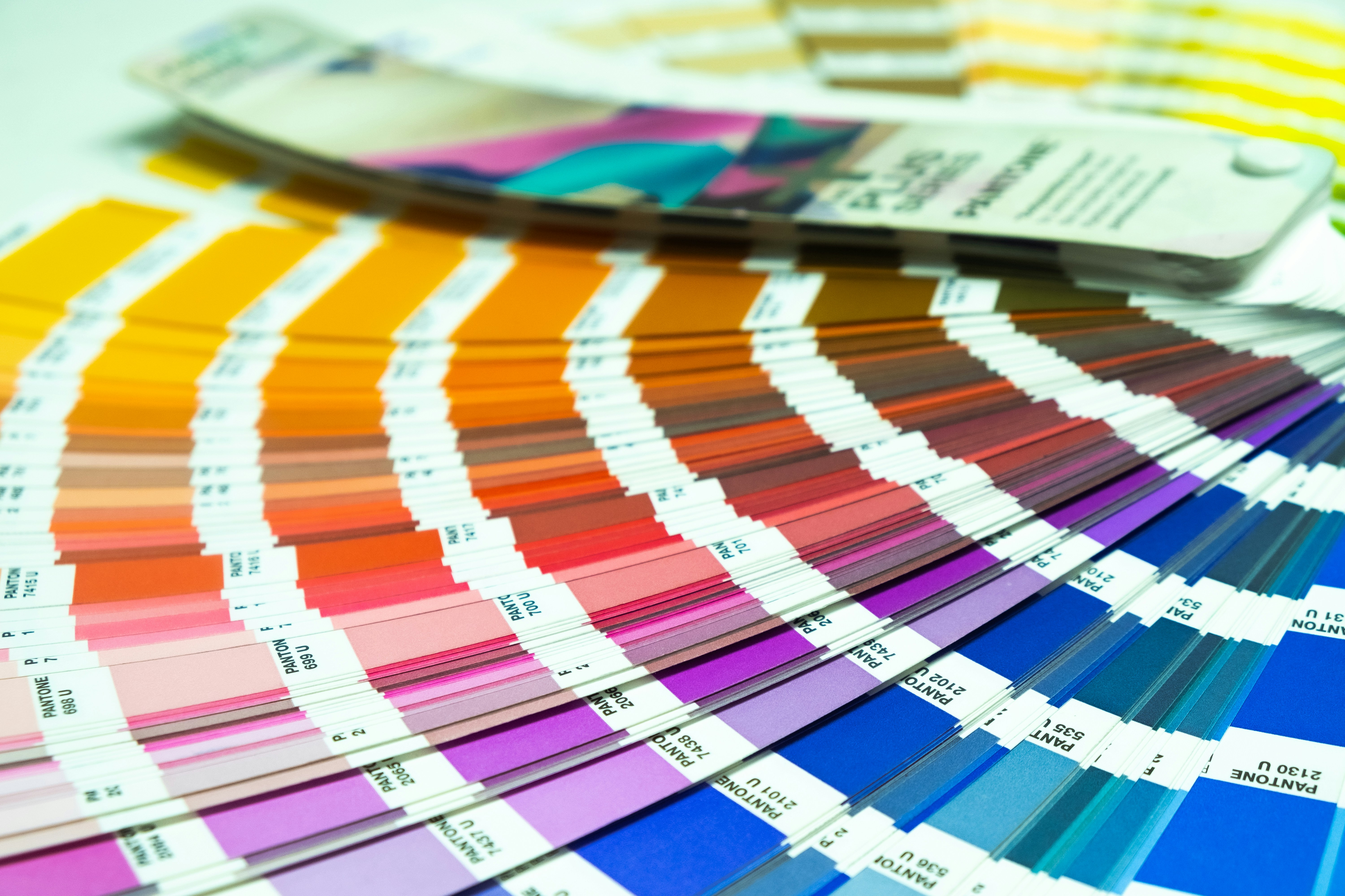 a close up of a pantone book with colors