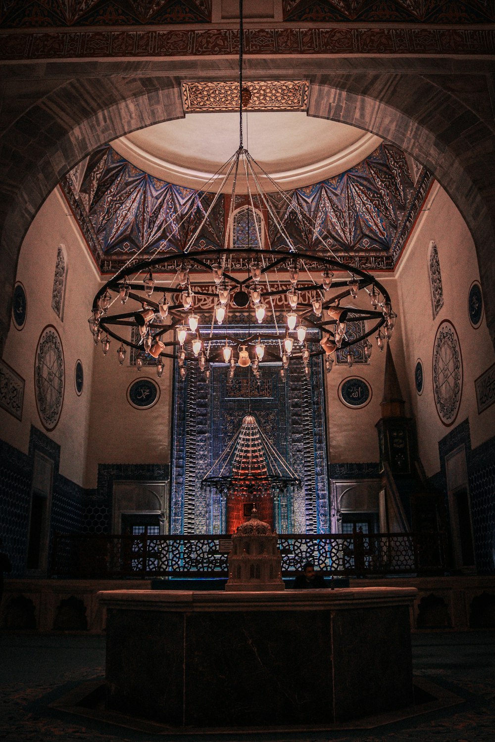 a chandelier hanging from the ceiling of a building