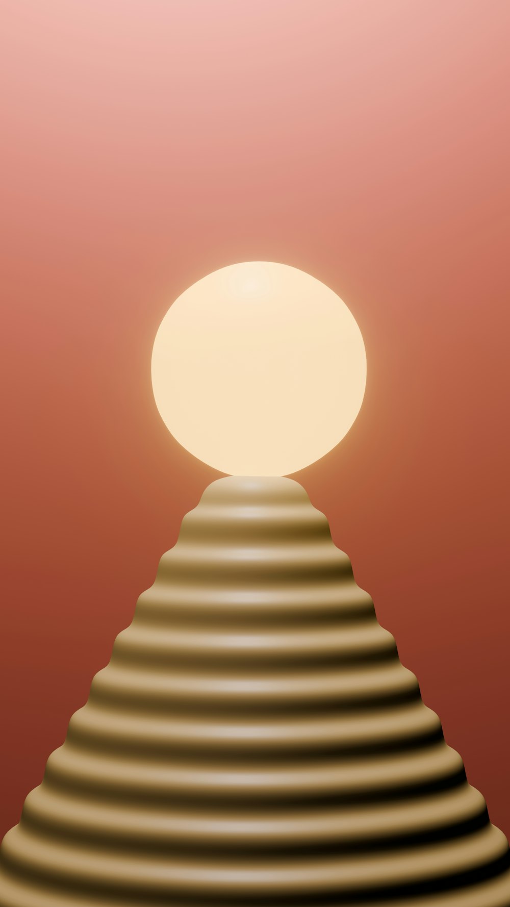 a large white ball sitting on top of a pyramid