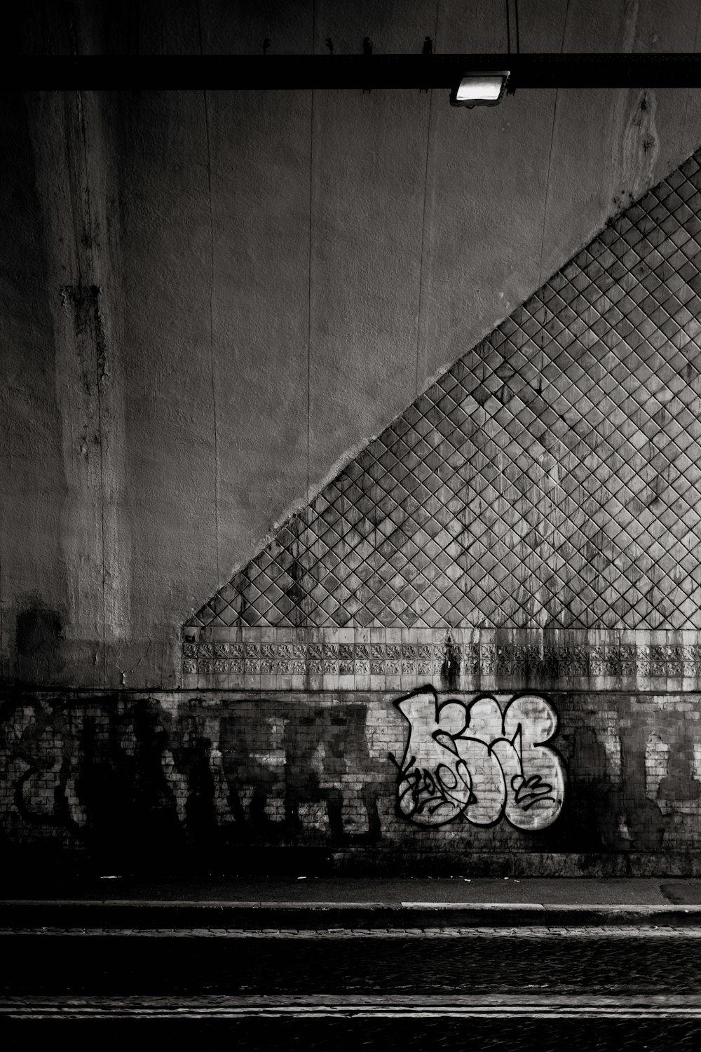 a black and white photo of a person on a skateboard