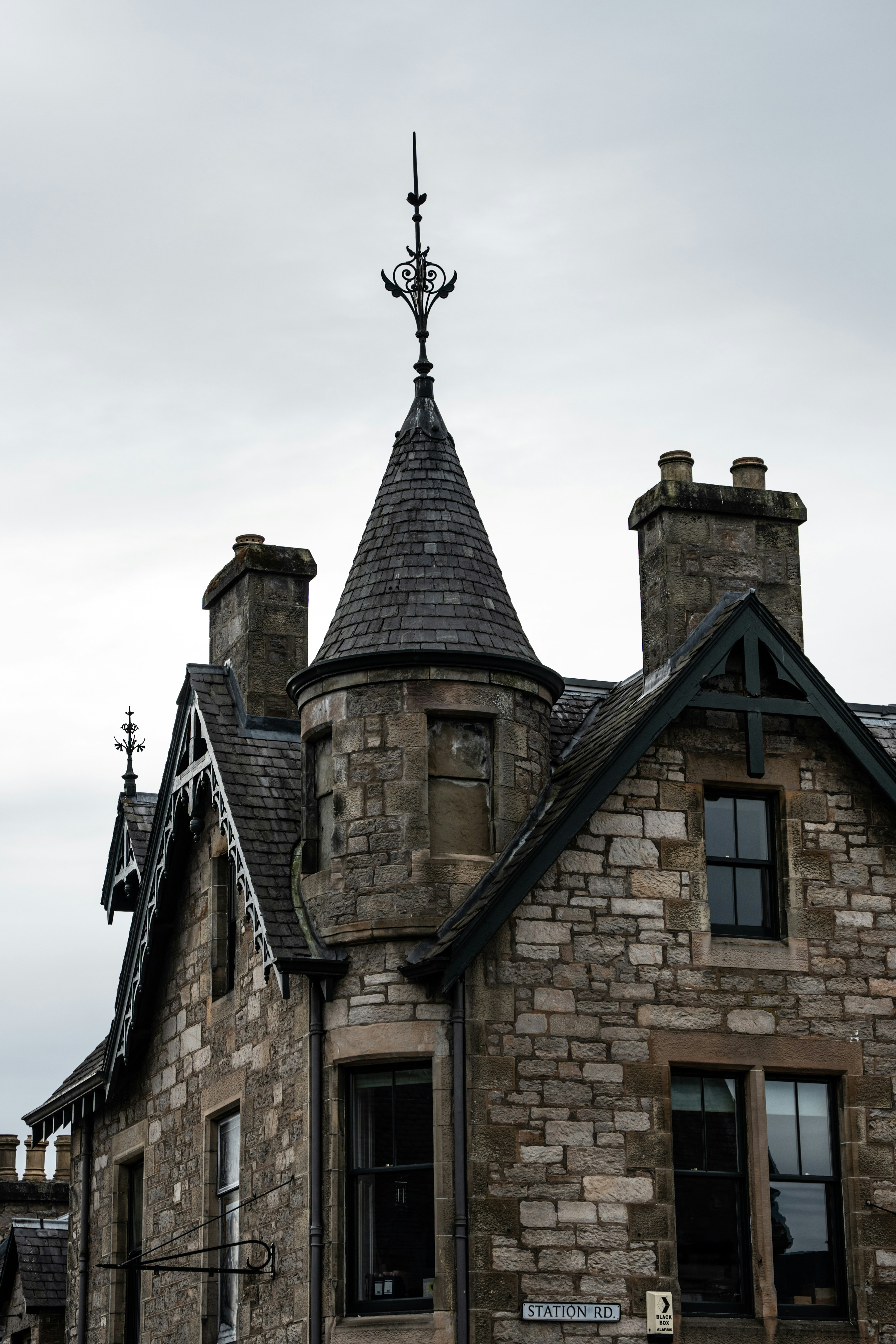 an old stone building with a clock tower