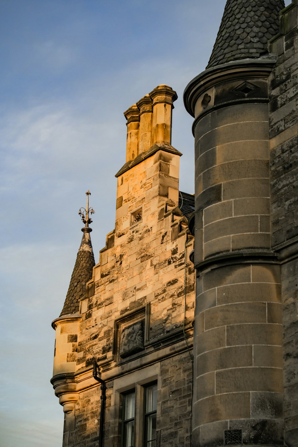 a tall building with a clock on the top of it