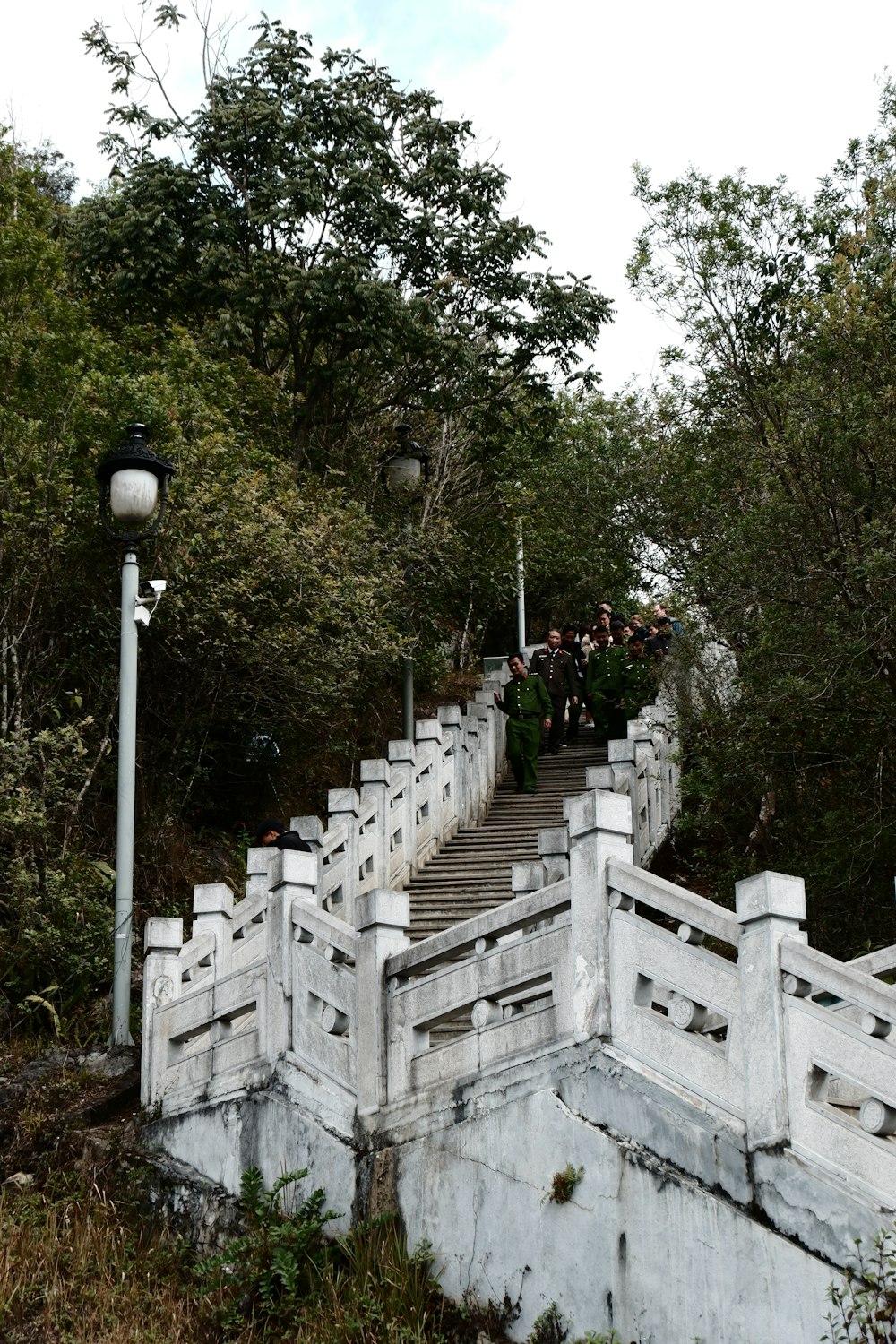 a stone bridge with steps leading up to the top