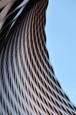 a close up of a building with a sky background
