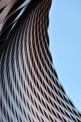a close up of a building with a sky background