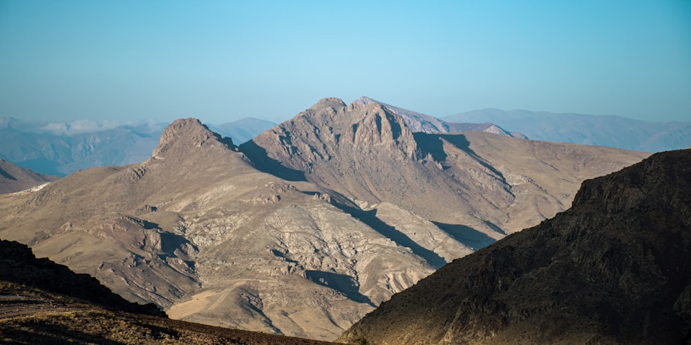 a view of a mountain range from a distance