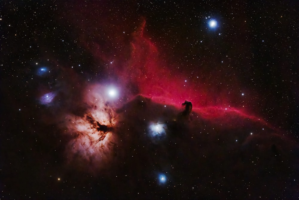 a large star cluster in the middle of a night sky