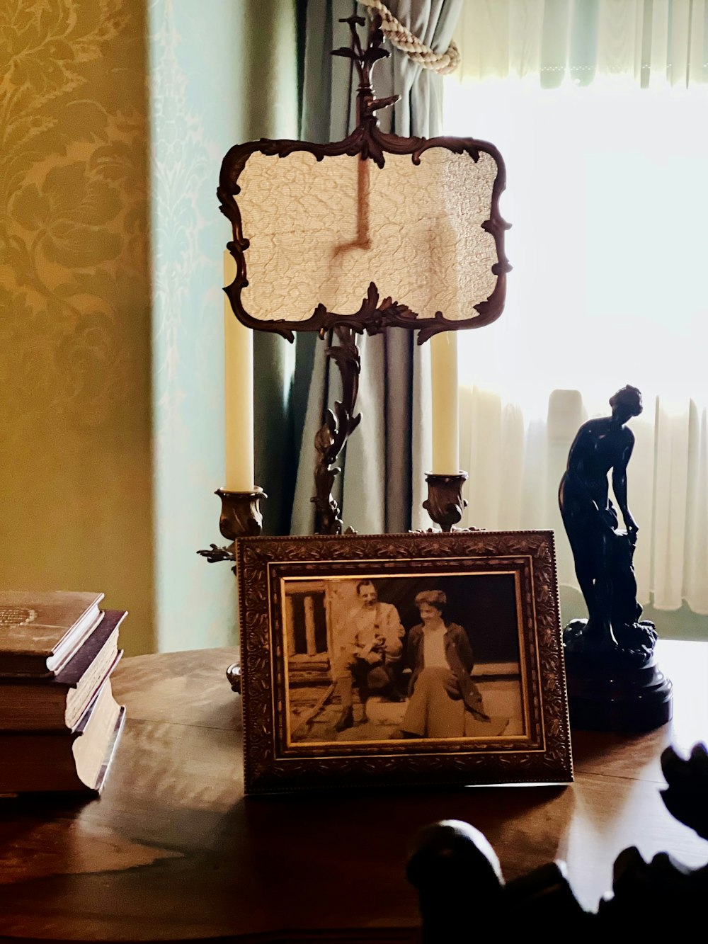 a picture frame sitting on top of a wooden table