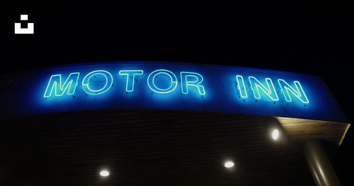 Golden Rim Motor Inn Sign A sign that reads motor inn lit up at night photo – Free Hotel Image on ...