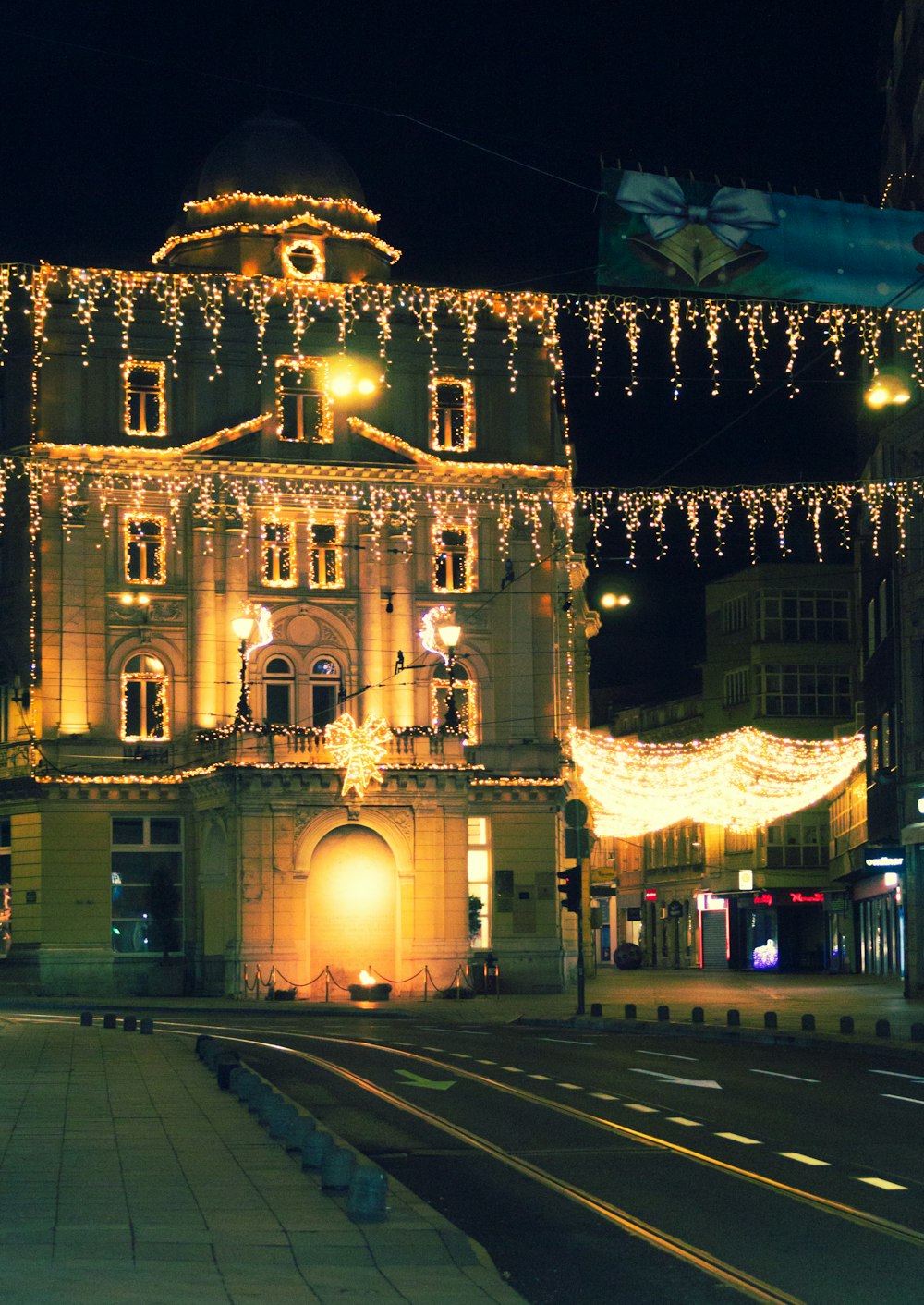 a large building with christmas lights on it