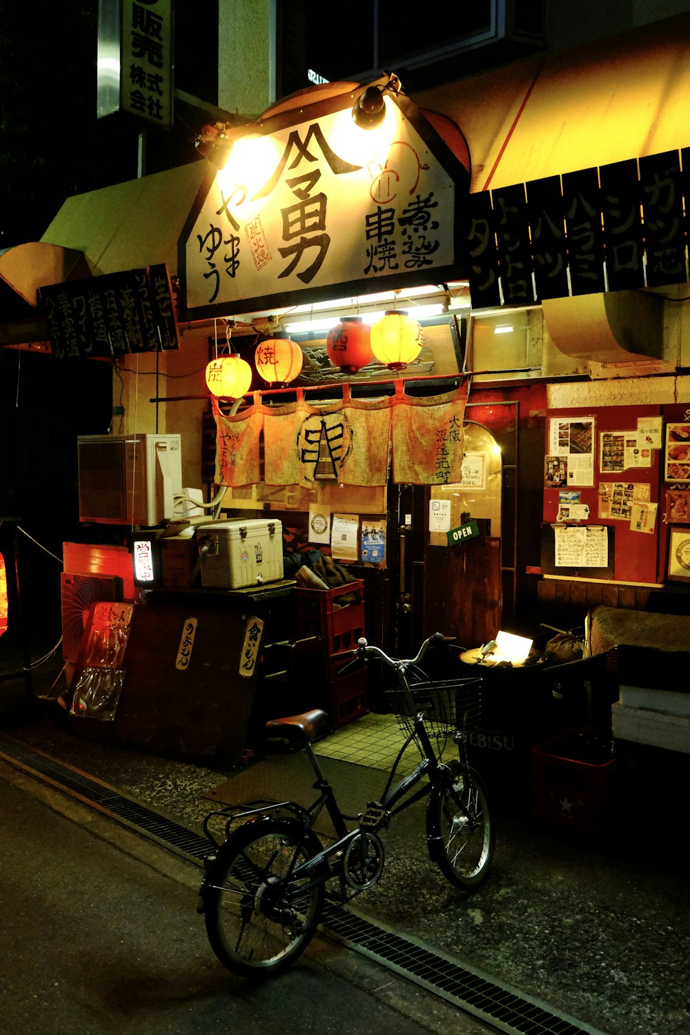 a bike parked outside of a chinese restaurant