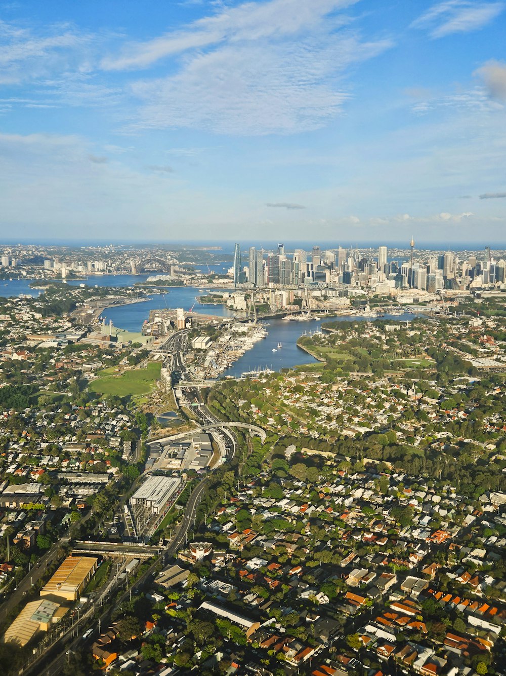 an aerial view of a city and a river