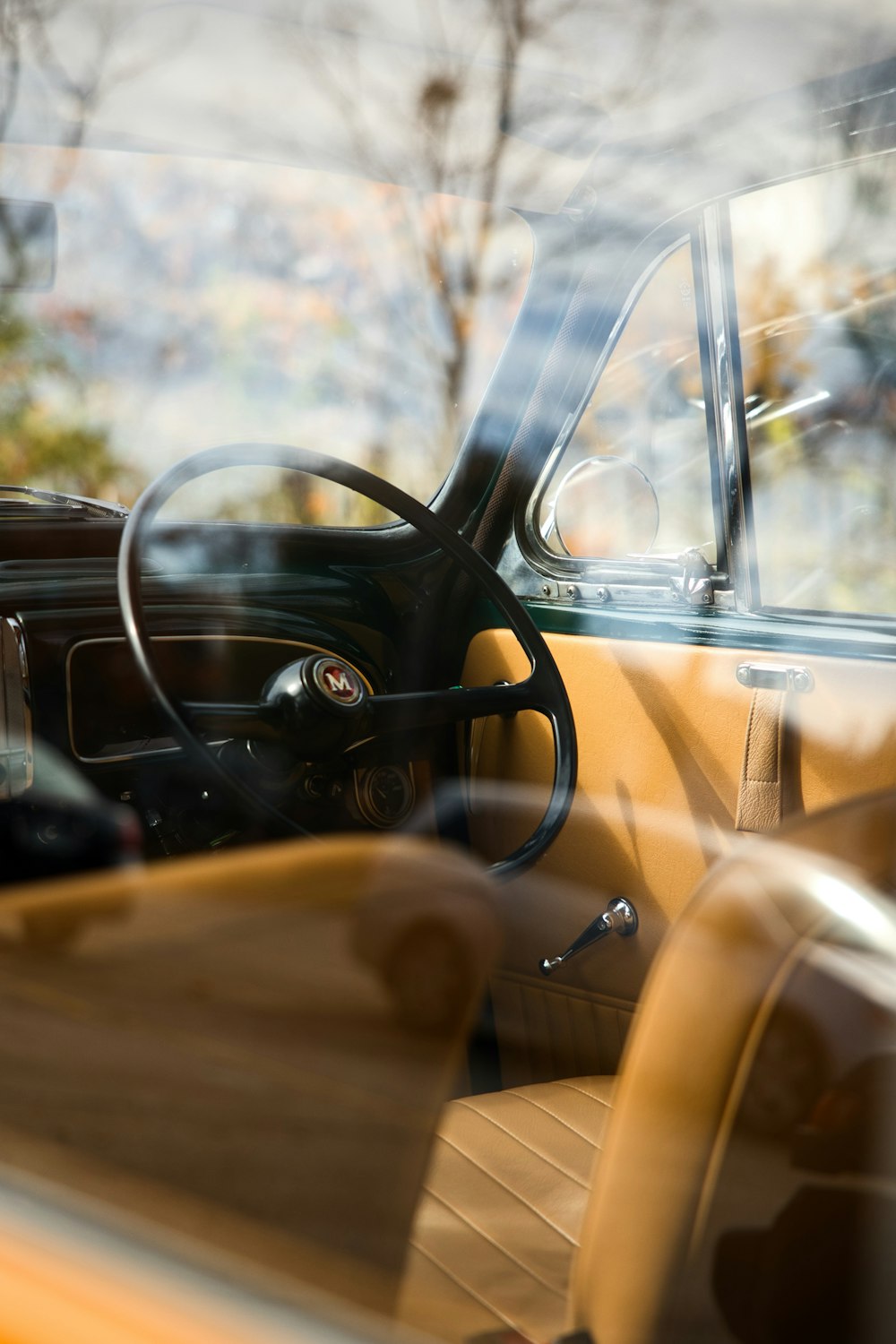 the interior of a car is shown through a window