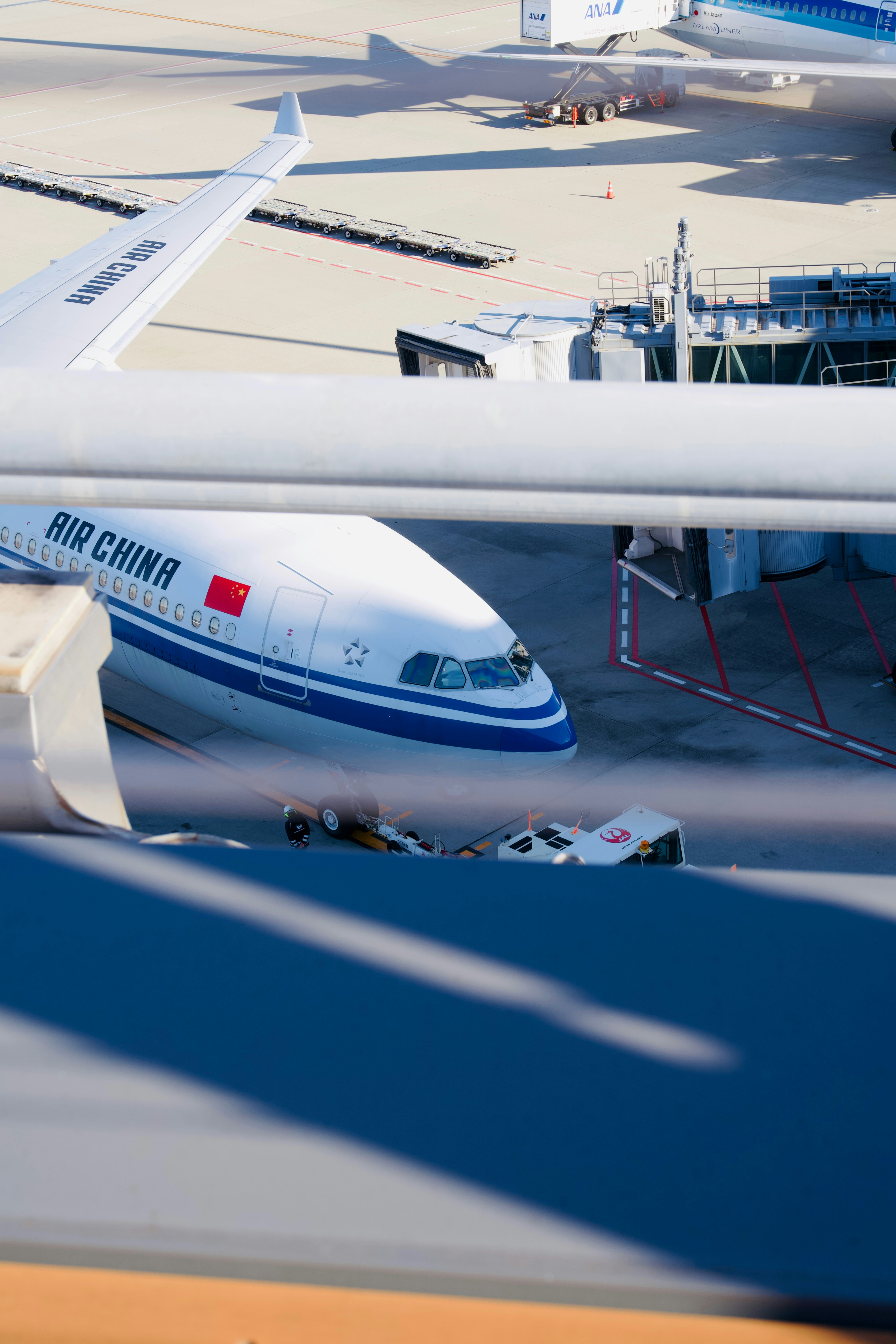 a large jetliner sitting on top of an airport tarmac