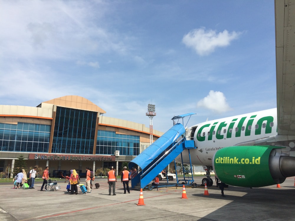 a large jetliner sitting on top of an airport tarmac