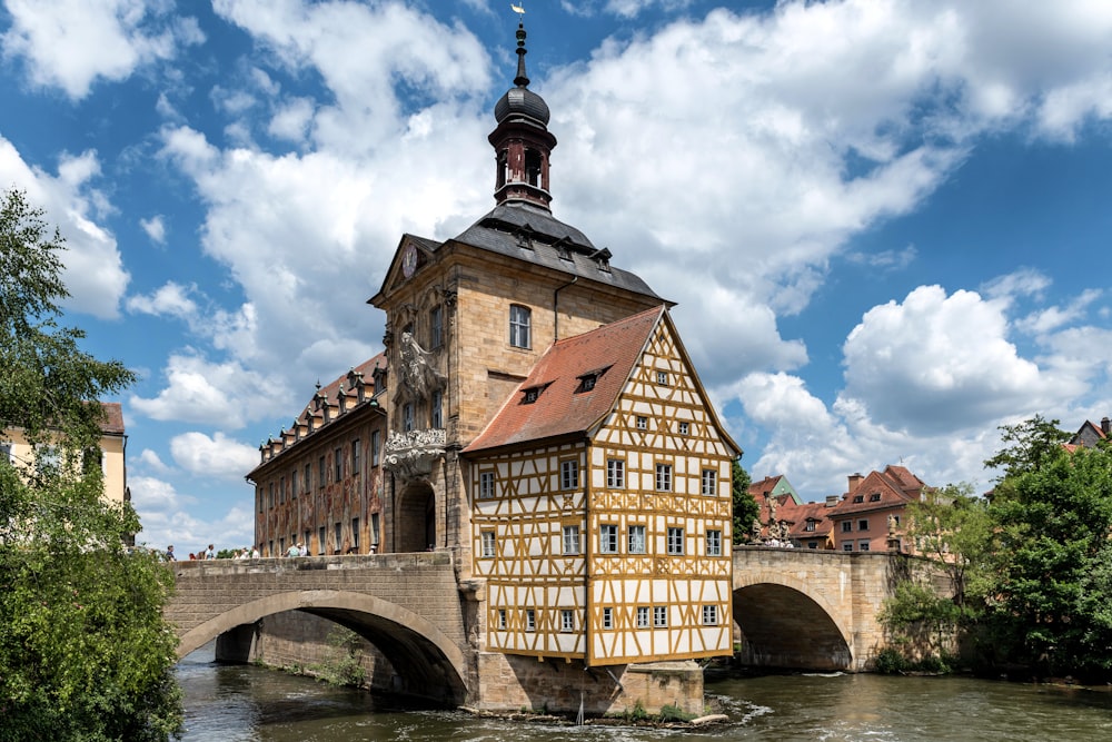 an old building with a bridge in front of it