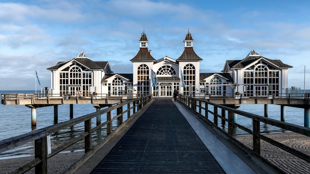 a pier with a building on top of it