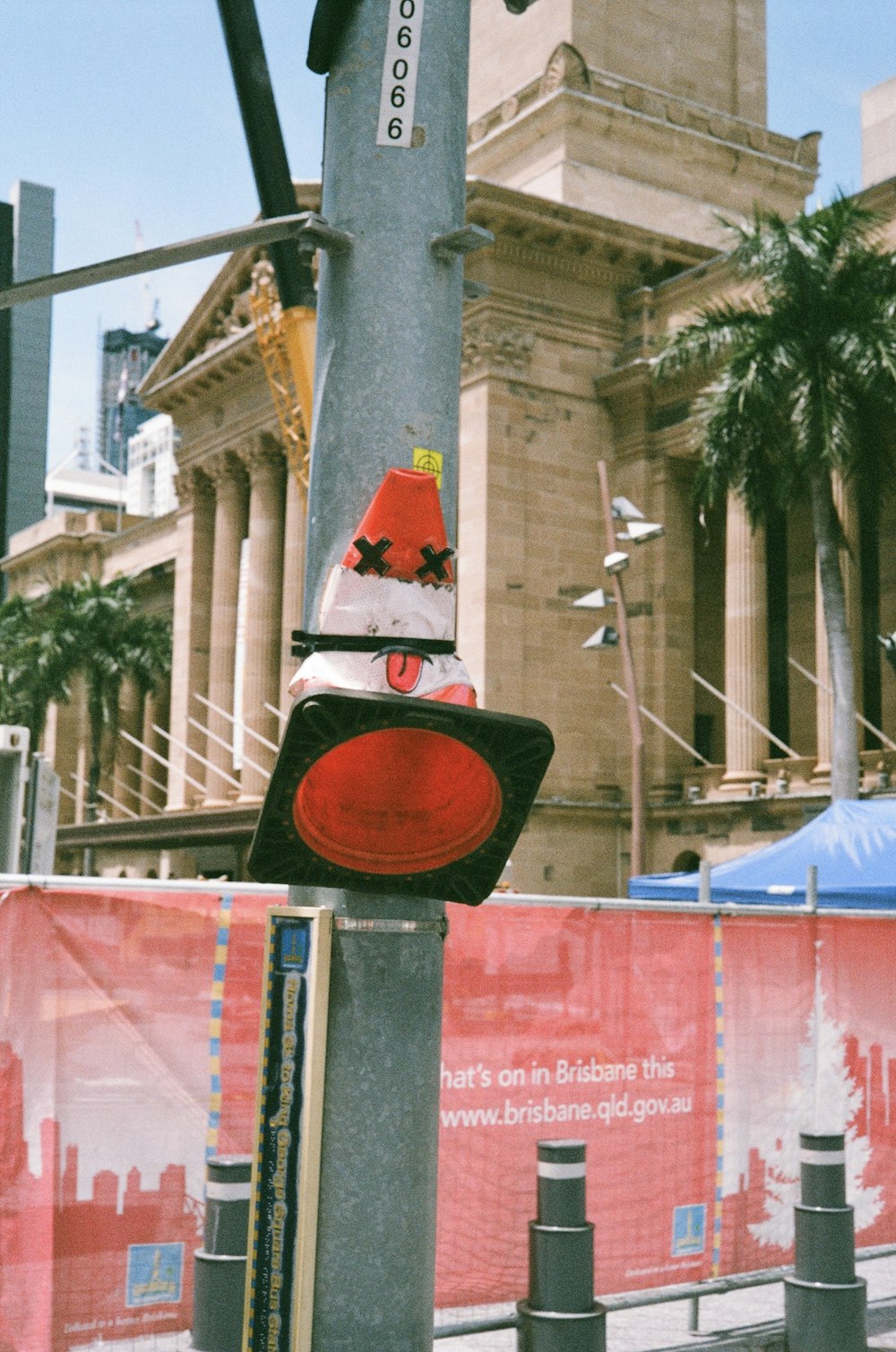 a traffic light sitting on the side of a road