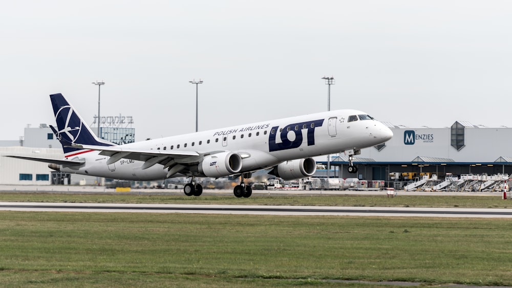 a large jetliner taking off from an airport runway