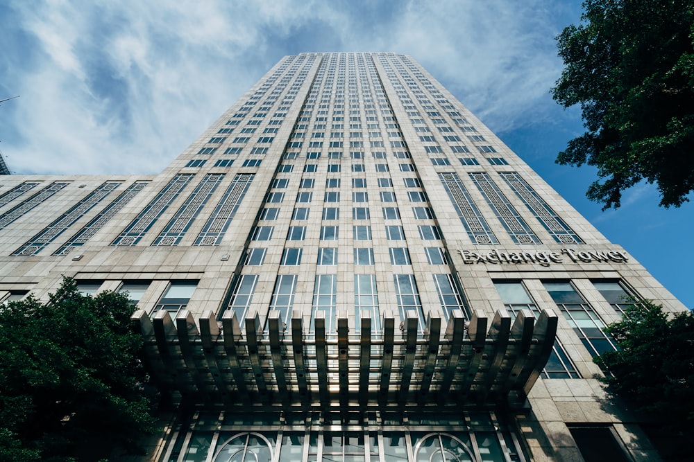 a very tall building with a sign on the side of it