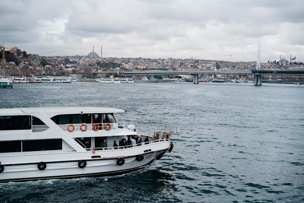 a large white boat on a body of water