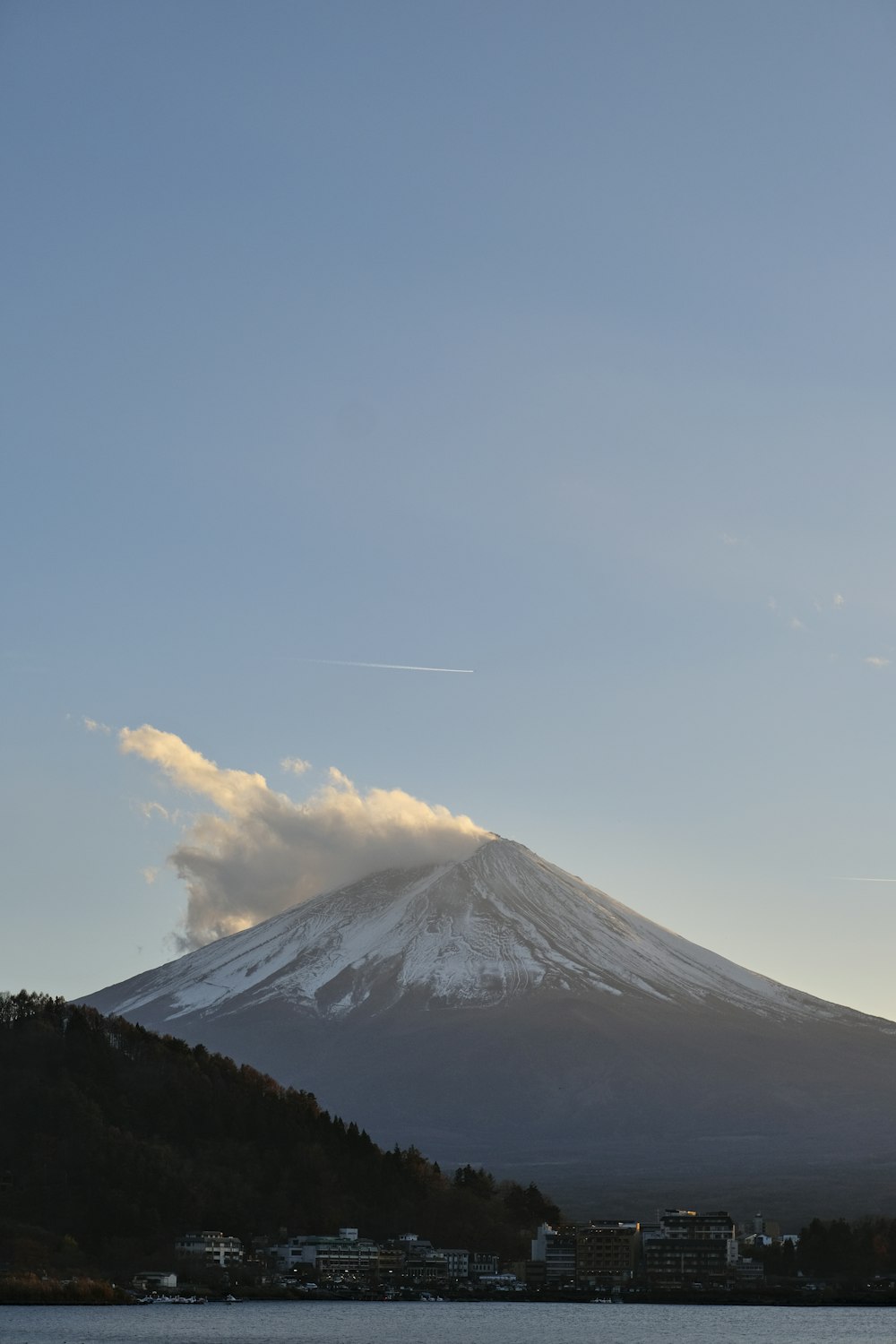 a mountain with a cloud in the sky