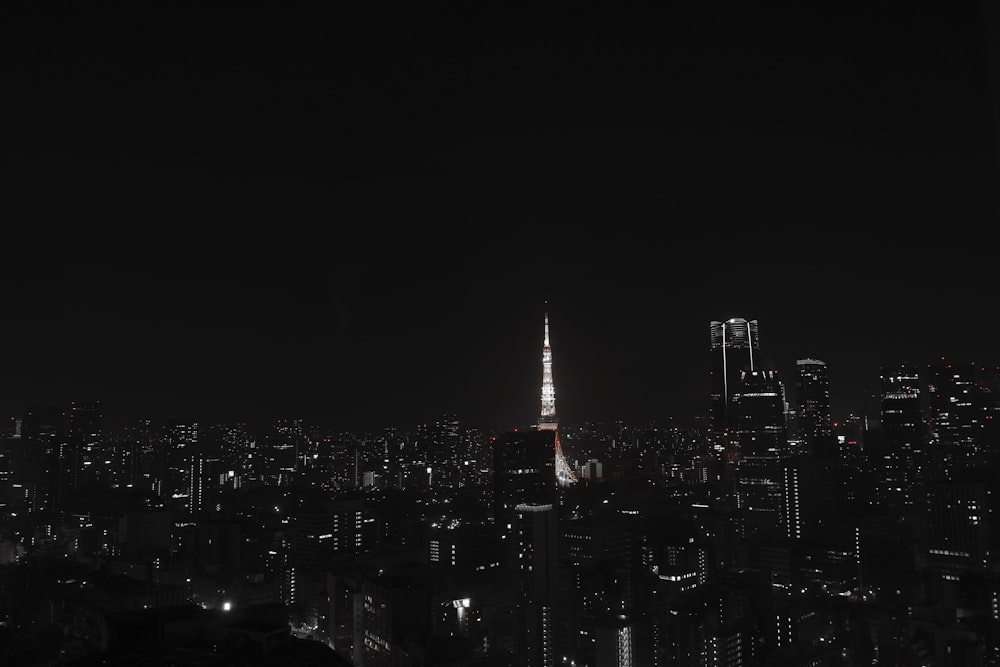 a view of a city at night from the top of a building