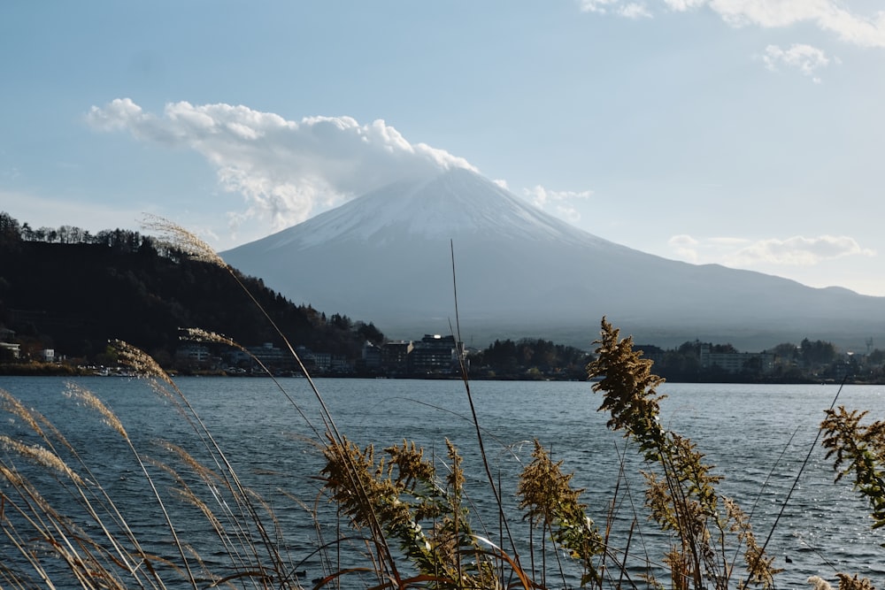 a view of a mountain with a lake in front of it