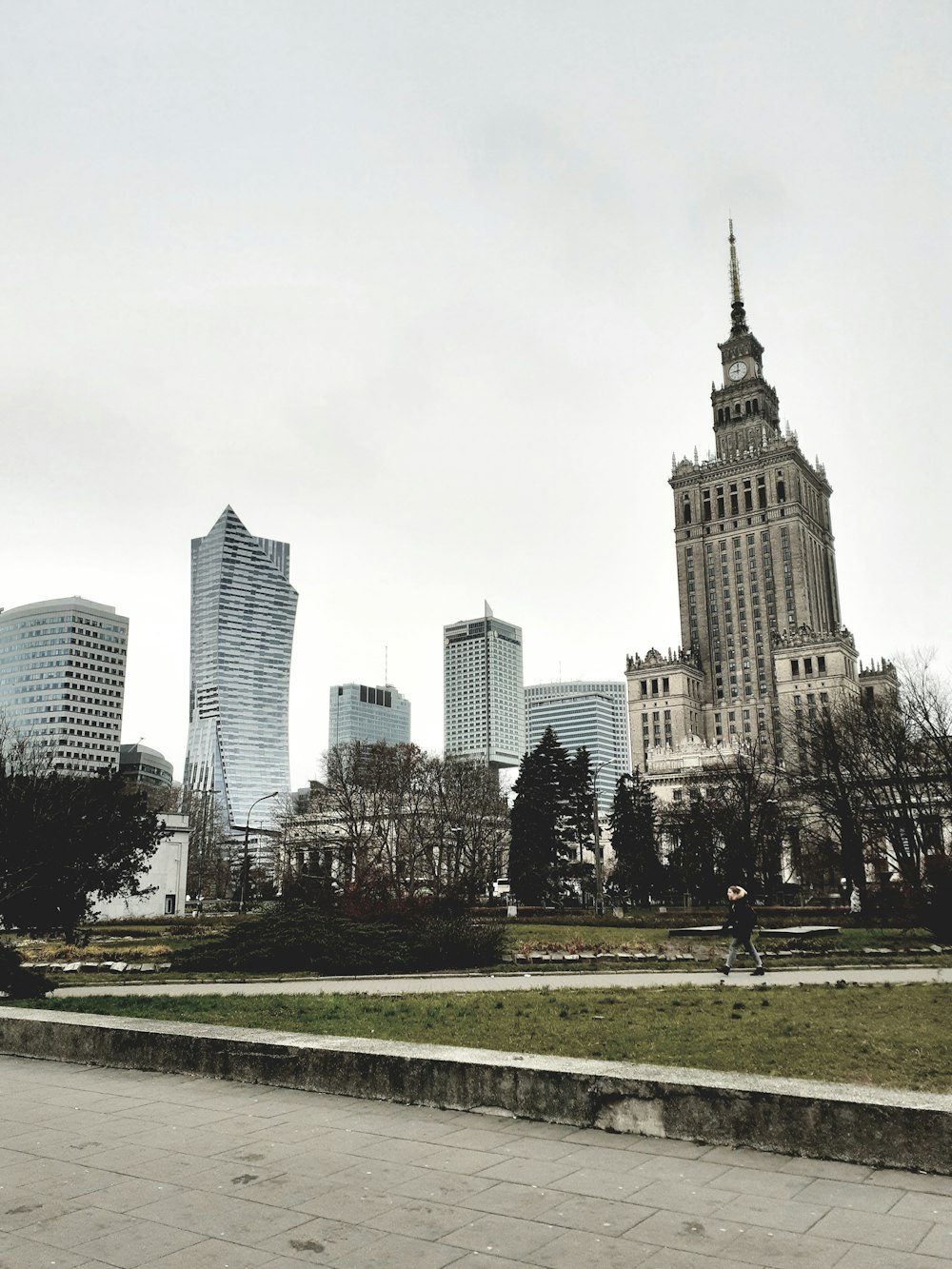 a view of a city with tall buildings in the background