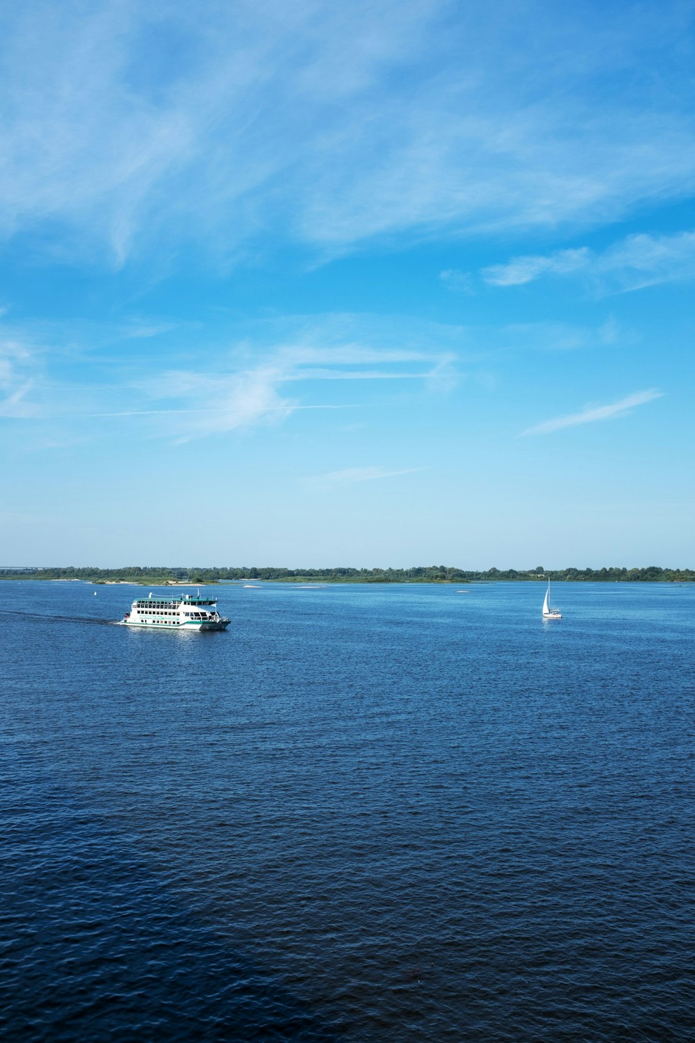 a large body of water with a boat on it