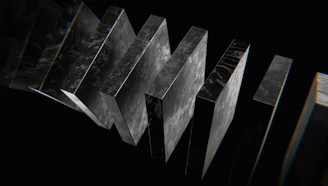a black and white photo of a number of metal objects
