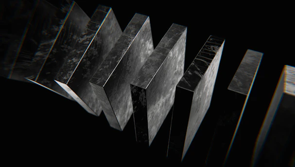 a black and white photo of a number of metal objects