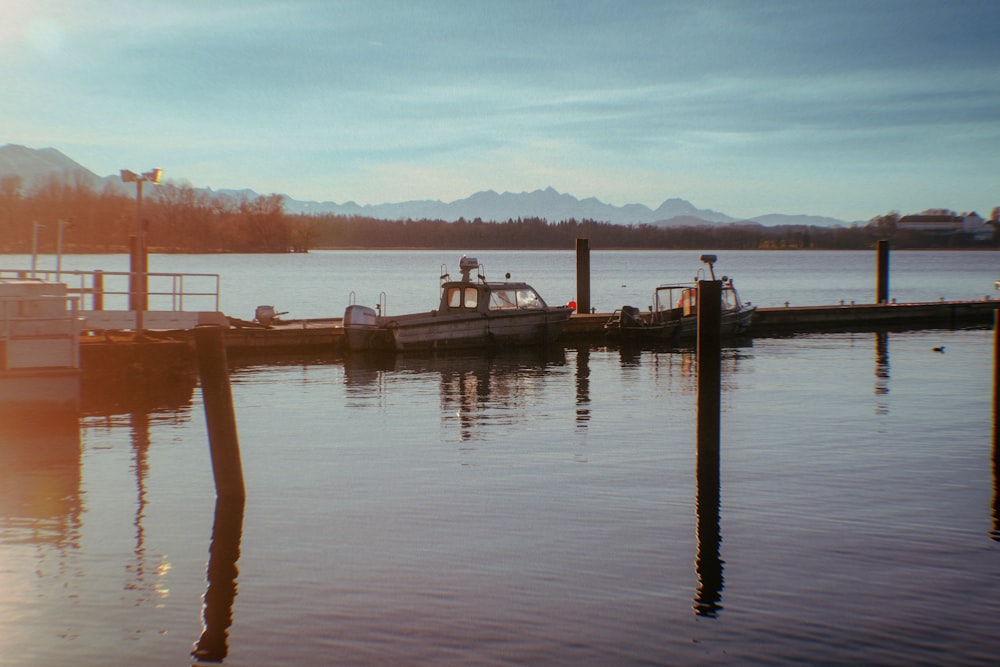 a couple of boats that are sitting in the water