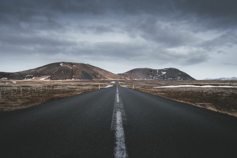 an empty road in the middle of nowhere