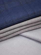 a close up of a blue and grey fabric