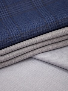 a close up of a blue and grey fabric