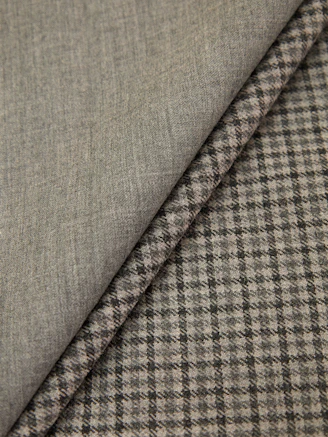 a close up of a gray and black checkered fabric