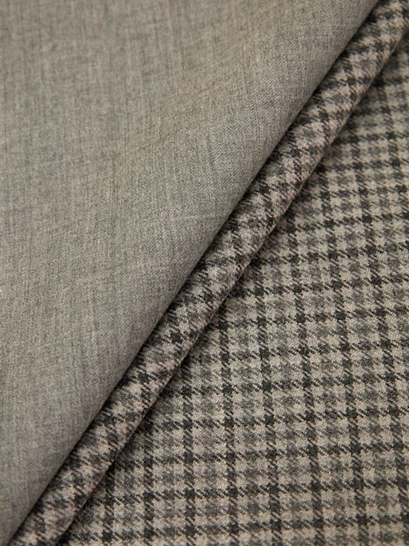 a close up of a gray and black checkered fabric